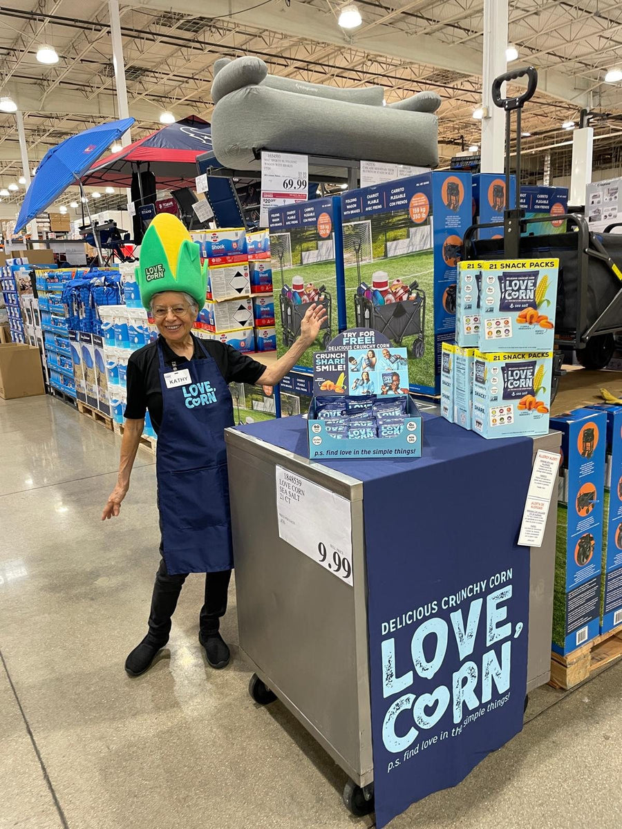 Custom LOVE CORN foam corn hat worn at a Costco in-store demo
